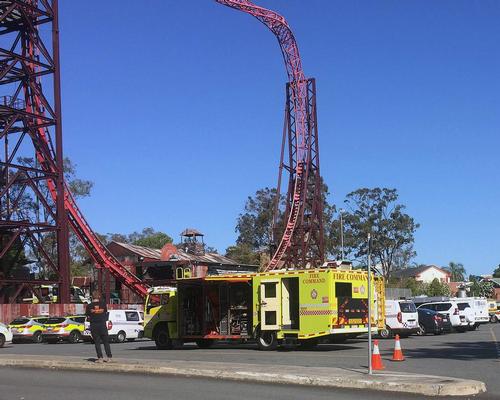Emergency services vehicles are seen outside the Dreamworld theme park at Coomera on the Gold Coast