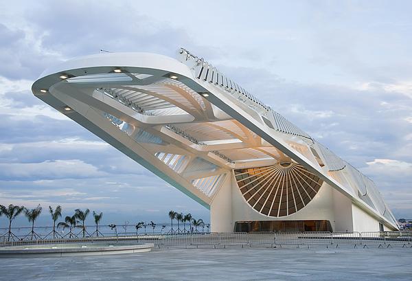 The museum’s skeletal roof soars above a public plaza