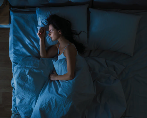 People who get regular, uninterrupted sleep do a better job sticking to their exercise and diet plans / Shutterstock.com/Gorodenkoff