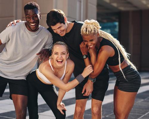 Working out in groups can boost wellbeing levels / Shutterstock/Jacob Lund