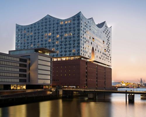 The Hamburg Elbphilharmonie concert hall is a shimmering, glass-covered building designed by Swiss architecture studio Herzog & de Meuron