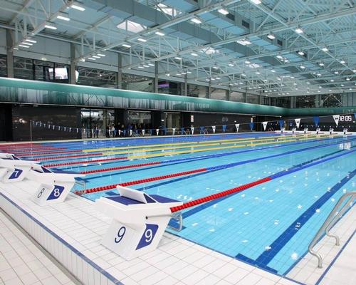 The completed centre features two full course swimming pools, a diving pool and a short course training pool / FINA