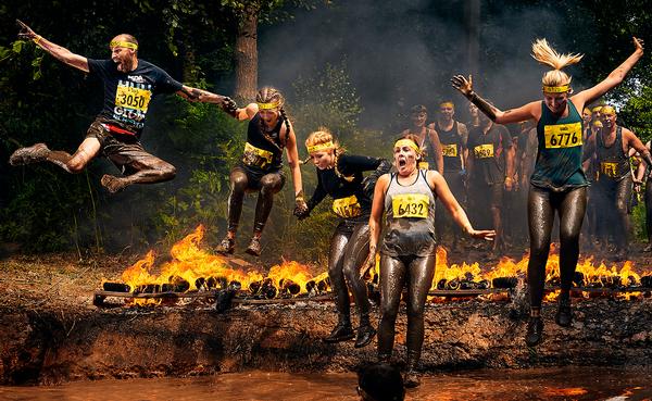 Tough Mudder challenges its participants with fire and electric shocks
