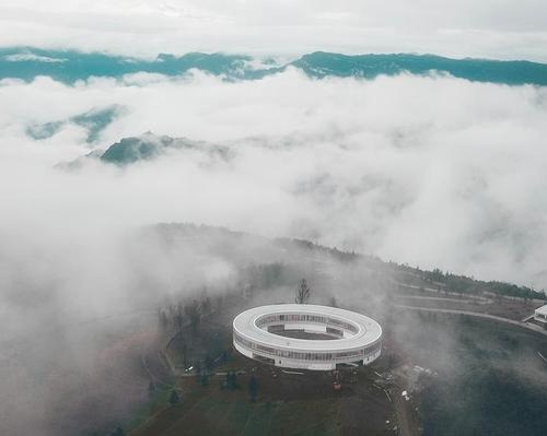 C+ Architects' LAB Art Museum is a glowing ring in the mountains